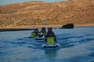 2-Hour Jet Ski Adventure to Balos - The safety approach: a guide boat right there with you