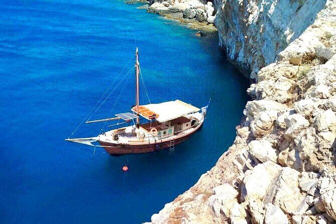 A Boat Trip to the Pirate Caves - Food and drinks onboard: local white wine, fruit, soda, and good music