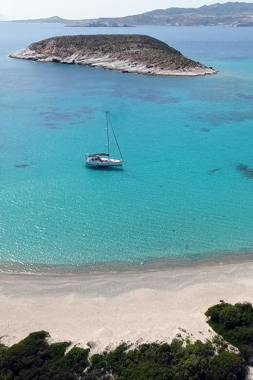 Adamantas: Full-Day Milos & Poliegos Boat Tour with Meals - Glaronisia and Pollonia: fishing-village scenery with a calmer beat
