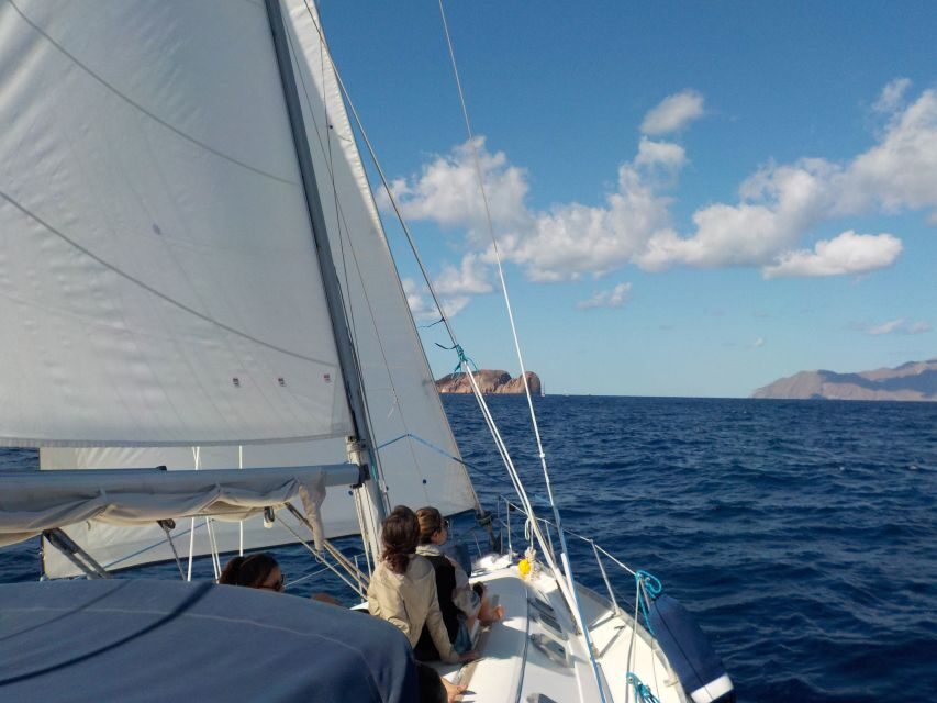 Adamantas: Milos Sightseeing Sailboat Cruise - West Milos sightseeing from the deck: catacombs, villages, and Venus de Milo
