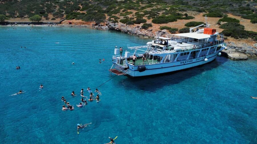 Agios Nikolaos: Fun Cruise Around Elounda Bay - On-board vibe: raki, watermelon, and the DJ factor