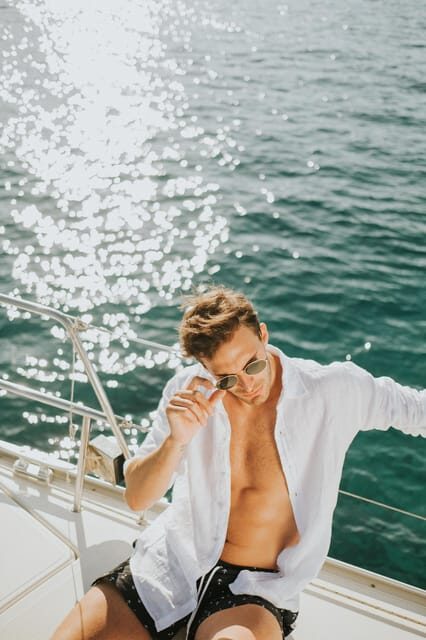 Agios Nikolaos: Golden Hour Sailboat Tour with Wine & Snacks - Kolokitha Bay Swim Stop: SUP, Snorkel, Fishing, and Real Water Time