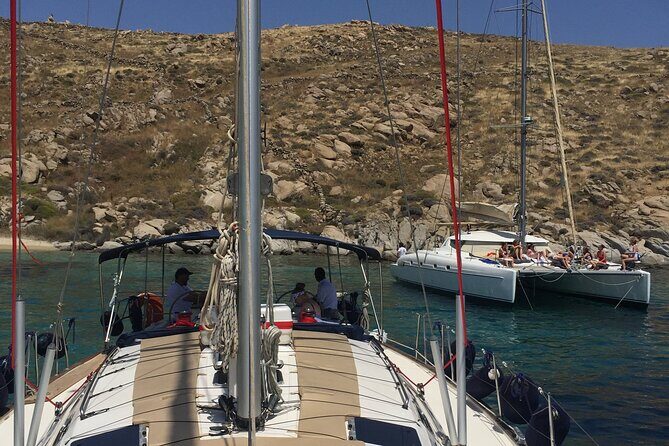 All inclusive Delos & Rhenia Islands tour up to 12 pax (free transportation) - Rhenia Island: snorkeling in clear water off an uninhabited shore