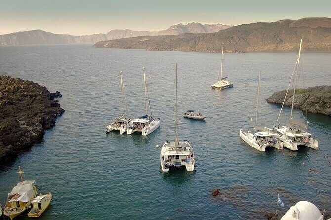 ALL-INCLUSIVE: Santorini Caldera Cruise with Greek Meal & Drinks - Nea Kameni dinner: full Greek meal plus chilled Santorini wine