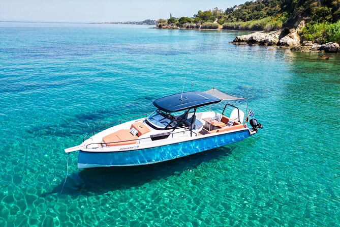 All inclusive VIP Zakynthos Boat Tour to Shipwreck & Blue Caves - Entering the Blue Caves by small boat