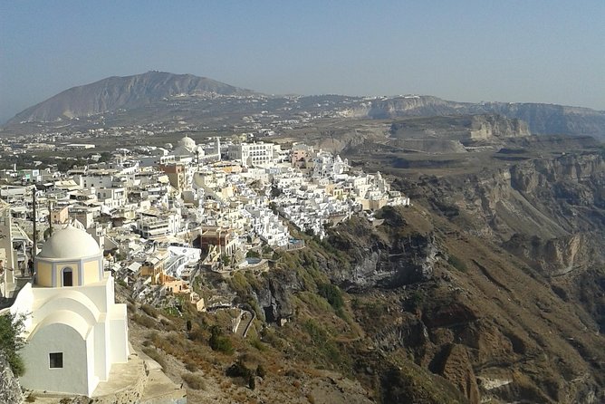 Amazing sightseeing in Santorini - Perivolos Beach and the long black-sand shore