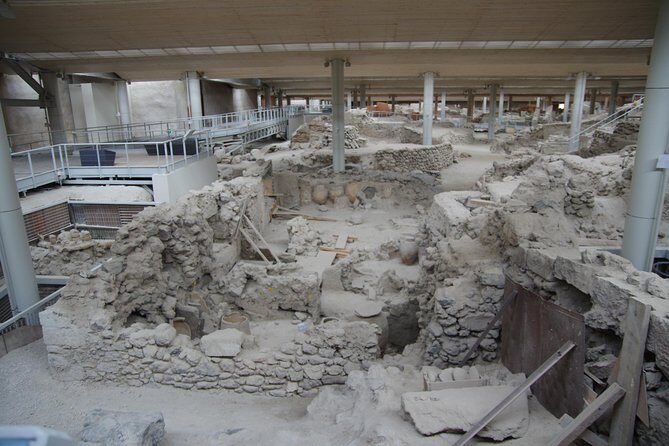 Archaeological Bus Tour To Akrotiri Excavations & Red Beach - Black-sand beach time: Perissa or Perivolos, plus real downtime
