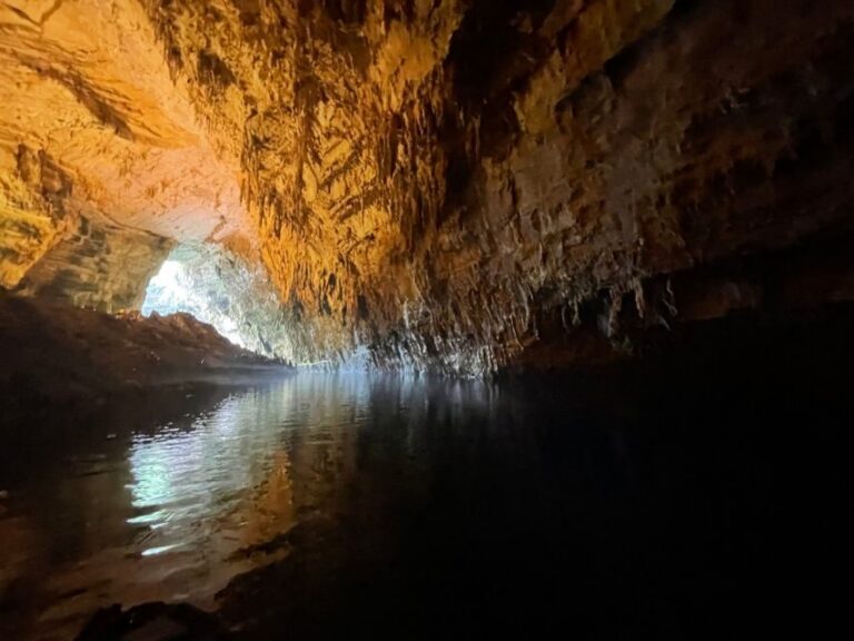 Argostoli: Melissani Lake, Drogarati Cave, and Myrtos Beach - Melissani Lake: Pan, Melissani myths, and a boat on striking blue water