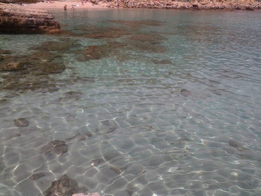 Argostolio: Melissani Lake, Myrtos Beach, and Fiscardo Tour - Melissani Lake and the island below the surface