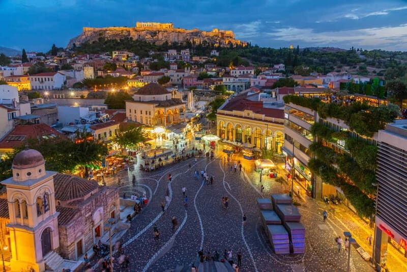 Athens by Night: Social Walking Tour to Meet, Connect, & Explore - Monastiraki Finale: The Acropolis Glow Over Lively Streets