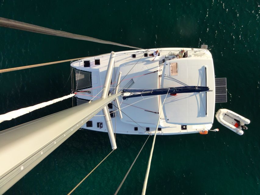 Athens: Catamaran Cruise with Fresh Lunch and Wine - Vouliagmeni Bay: the famous Athens Riviera stop, with another swim window