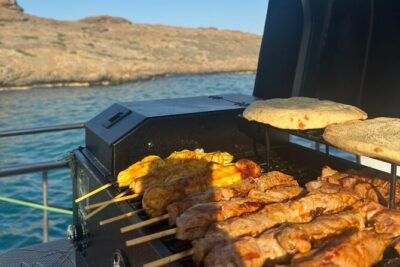Athens Cruise Tour with Mediterranean BBQ - Vravrona Bay and the tiny church-topped islet