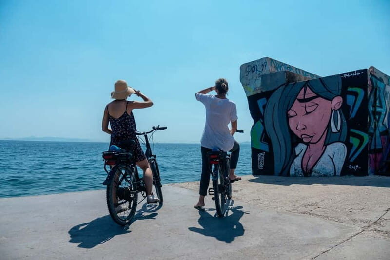 Athens: Electric Bike Seaside Tour with Guide - Stavros Niarchos: modern Athens, not just a quick photo