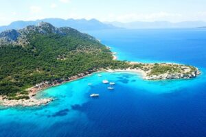 Athens: Full-Day Island Hopping Cruise with Lunch and Swimming - Agistri: Small Island Time for Pine Cliffs, Traditional Lanes, and Emerald Water