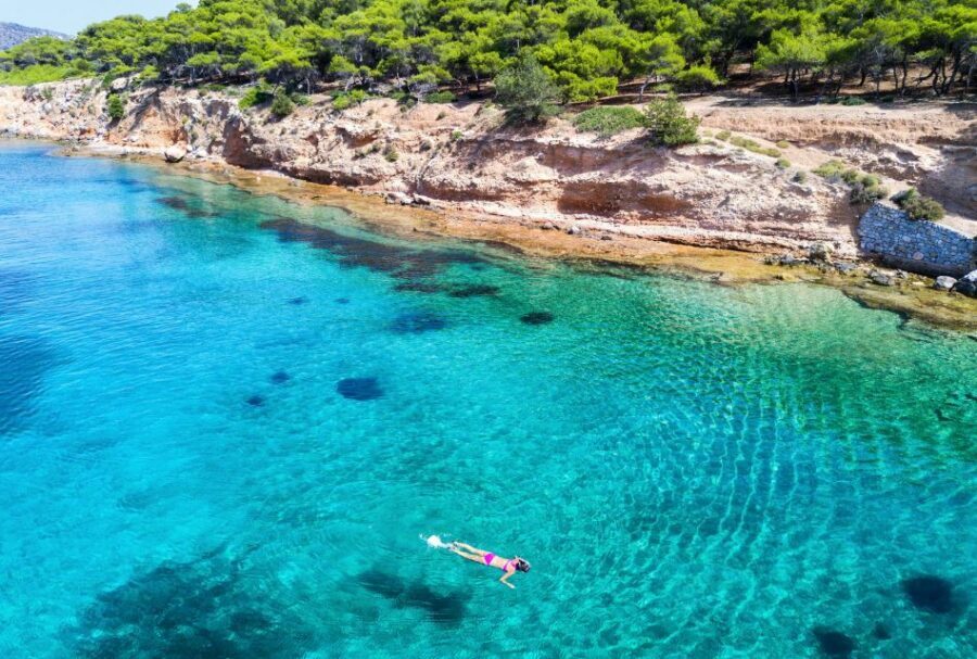 Athens: Full-Day Island Hopping Cruise with Lunch & Transfer - Moni Island Nature Park: Peacocks, Deer, and a Beach Lunch With Drinks