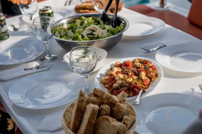 Athens: Half-Day Morning Catamaran Cruise with Meal & Drinks - The crew makes the trip: friendly hosting and competent sailing