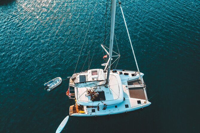 Athens Private Full day Catamaran cruise with meal & drinks - Stop 1 at Aegina: Agia Marina Bay swim and snorkel