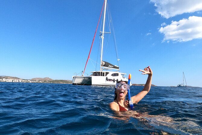 Athens Private Full day Catamaran cruise with meal & drinks - Lunch onboard: seafood pasta, salads, appetizers, and real drinks