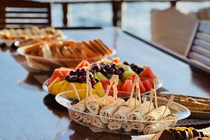 Athens Riviera Sunset Cruise with Snacks and Drinks Included - Getting There: Pasalimani Meeting Point and Finding the Right Boat