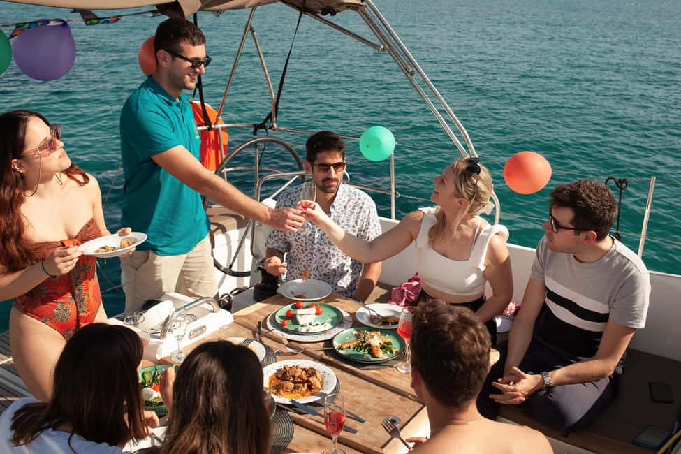 Athens: Semi Private Sunset Sailing and Gastronomy Cruise - Watching the Aegean sunset from the yacht
