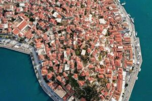 Athens Three-Island Cruise: Hydra, Poros & Aegina w/Lunch Incl - Poros Port: a quick change of pace for swimming and strolling