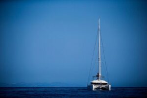 Beautiful Day Catamaran Caldera Cruise incl. Meal & Drinks - Stop 1: Volcano Sailing and the Hot Springs Swim (and What’s Not Included)