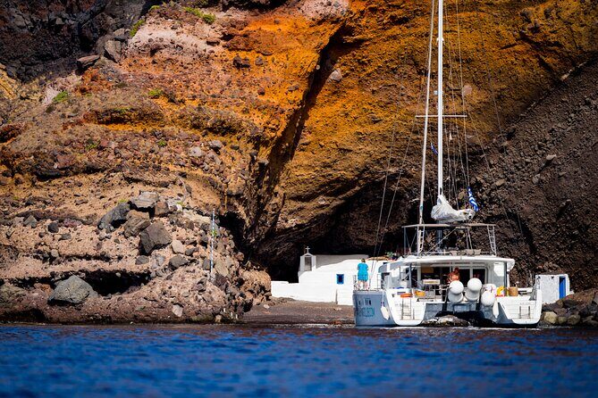 Beautiful Day Catamaran Caldera Cruise incl. Meal & Drinks - Indian Rock and the Venetian Lighthouse: The Photo Moments You’ll Want