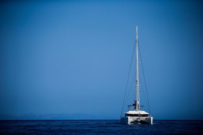 Beautiful Day Catamaran Caldera Cruise incl. Meal & Drinks - Stop 1: Volcano Sailing and the Hot Springs Swim (and What’s Not Included)