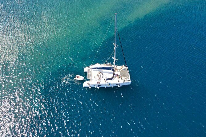 Best of Santorini Private Half-Day Catamaran Cruise with transfer and meal - Meal at Sea: Lunch or Dinner With Crew Energy