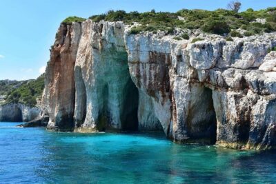 Blue Caves of Zakynthos - Entering the Blue Caves and natural arches