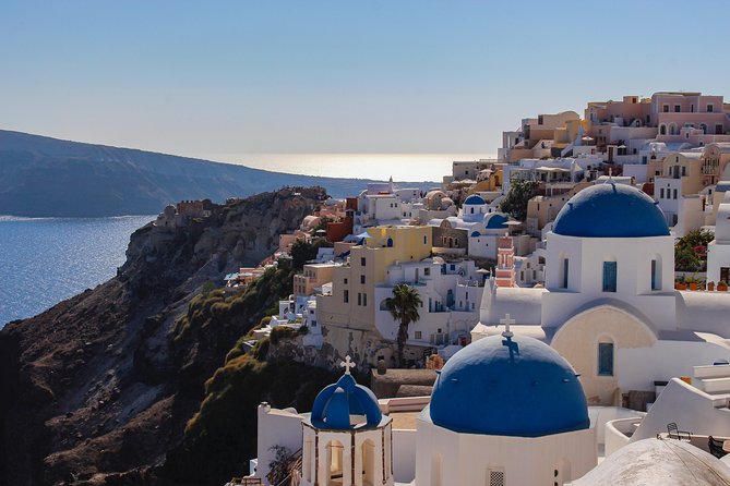 Blue Dome and Oia Sunset Small Group Transfer - The missing Fira bars and local spots