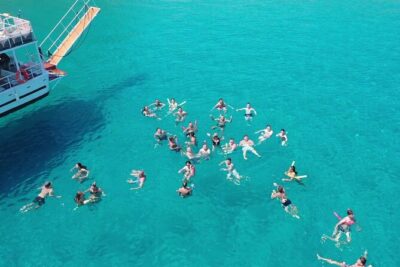 Boat Cruise in Lindos with Swim Stops & Meal Deal - Fifty minutes at Navarone Bay