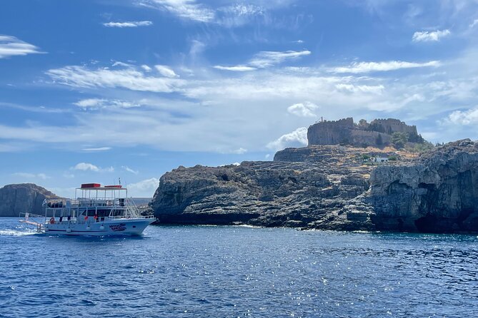 Boat Cruise in Lindos with Swim Stops & Meal Deal - Haraki Beach before the return to Lindos