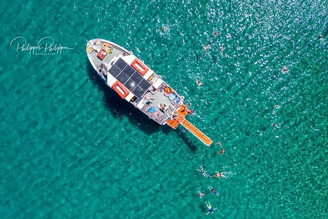 Boat Cruise in Lindos with Swim Stops & Meal Deal - Food, drinks, and what is included