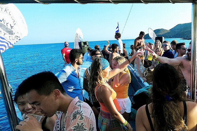 Boat Party with Swimming Stop Experience in Mykonos - Booking, weather, and cancellation details