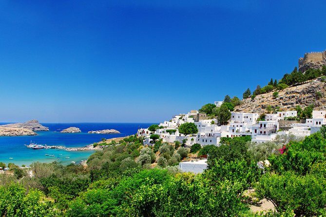 Boat Trip to LINDOS with Swimming Stops at Anthony Quinn's & Tsambika Bays - Boat comfort: sun deck, restroom, and the reality of crowds