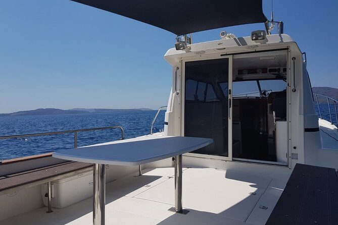 Caldera Private Cruise & Volcano Hike - Agios Nikolaos Islet: a calmer swim in deep blue water