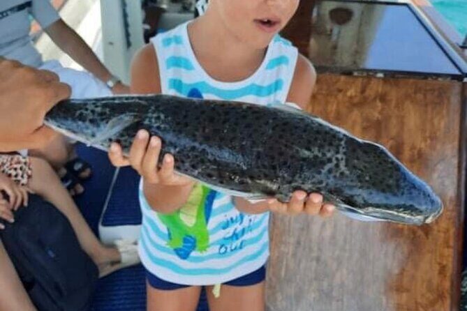 Captain Manolis Fishing with barbecue on the boat - First catch: trolling for little tuna, then bottom fishing