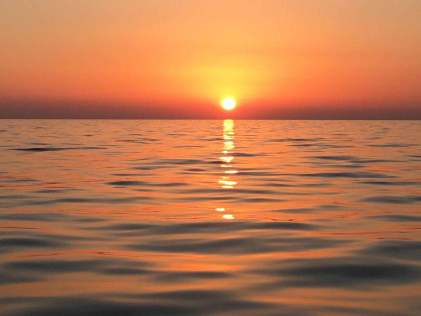 Catamaran Afternoon Cruise: Kleftiko half day with sunset - Sunset past Klima and the old fishing villages