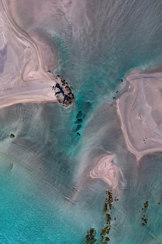 Chania: Full-Day to Elafonissi Beach Direct with No Stops - Entering Elafonisi: pink sand, shallow water, and protected habitat