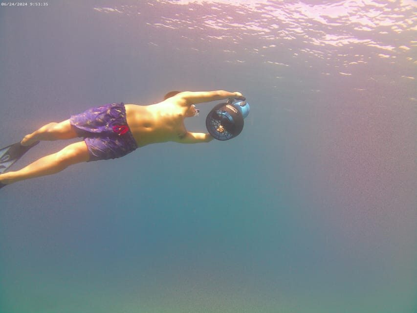 Chania: Sea Scooter Snorkeling boat tour - Onboard value: snacks, photos, and the small comforts that matter