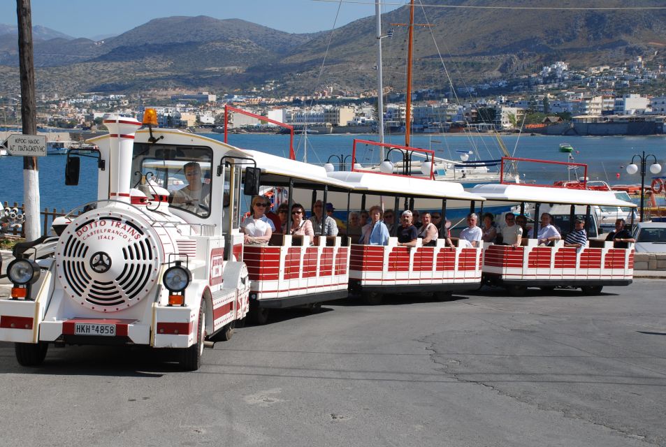 Chersonissos: Mini-Train City Highlights Tour - The port brings boats and coastal views