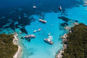 Corfu/Benitses/Lefkimmi: Paxos, Antipaxos, & Caves Cruise - How the Boat Ride Sets the Tone (Crew, Bar, Wi‑Fi)