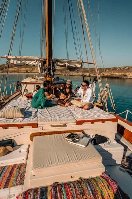 Corfu: Sunset Cruise on a Traditional Wooden Sailing Yacht - Leaving Benitses Marina as the light changes