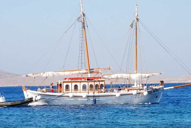 Corfu: Sunset Cruise on a Wooden Vessel with Cocktails & Bites - Food, Cocktails, and the On-Board Tone