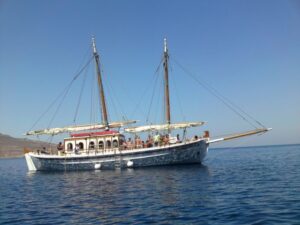 Corfu Town: Full-Day Cruise with Lunch, Drinks & Swim Stops - Getting started: Corfu Old Port and the wooden boat Koryfo
