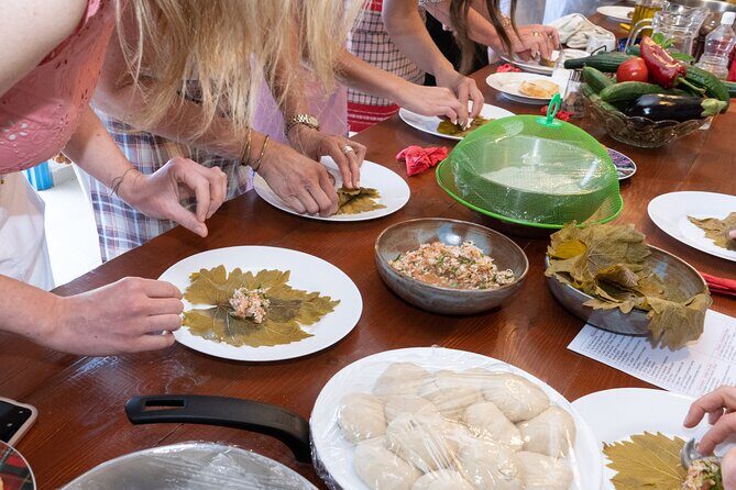 Cretan Cooking Class and Dinner: Evening in a Rethymno Home - Dolmadakia, moussaka, and giouvetsi: the meal rounds into form