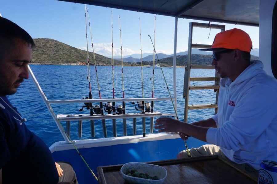 Crete: Fishing & Swimming Boat Cruise with Lunch & Drinks - Sailing past the islands: scenery without the pressure