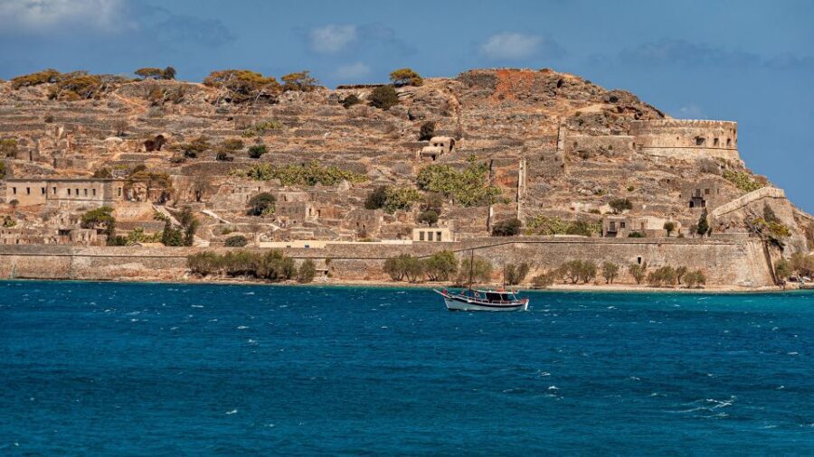 Crete: Spinalonga Boat Tour with BBQ & Agios Nikolaos - Pickup and coach ride: what to expect with a large-group tour