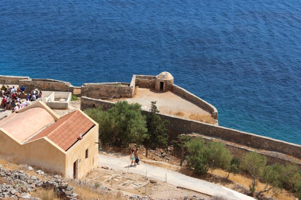 Crete: Spinalonga, Elounda, & Agios Nikolaos Tour w/ Pickup - The Elounda boat crossing and coastal stop